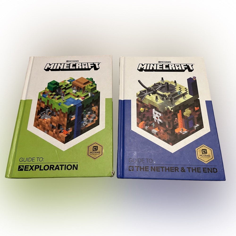 Minecraft books Guide to:EXPLORATION and Guide to:THE NETHER & THE END hardcover